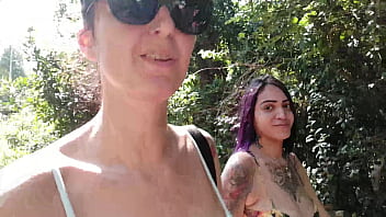 Interracial threesome with a busty Latina at a nudist beach